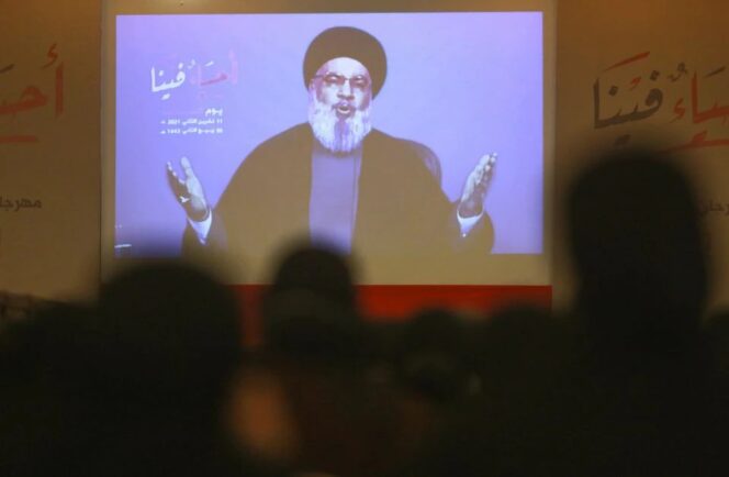 
 Pemimpin Hizbullah Lebanon Sayyid Hassan Nasrallah saat menyampaikan bantahannya melalui siaran langsung TV Al Mayadeen Lebanon, Jum'at (18/3/2022)