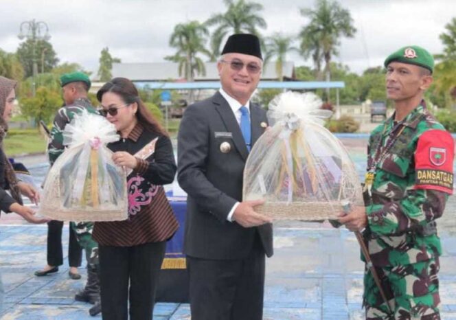 
 Satgas Pamtas RI–Malaysia Resmi Diganti, Bupati Wempi Sampaikan Apresiasi