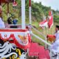 Hujan Tak Menyurutkan Khitmat Upacara Penurunan Bendera HUT Ke-81 RI di Perbatasan Negara